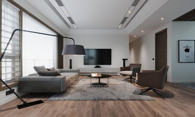 Sofa phòng khách được thiết kế với bọc nỉ và gam màu trầm sang trọng.